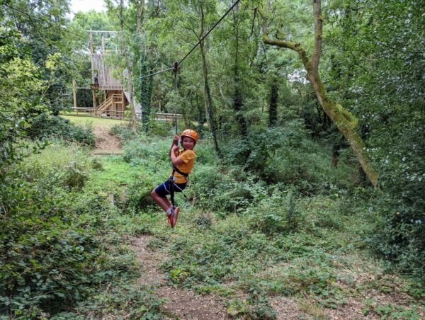 Boy on zip wire